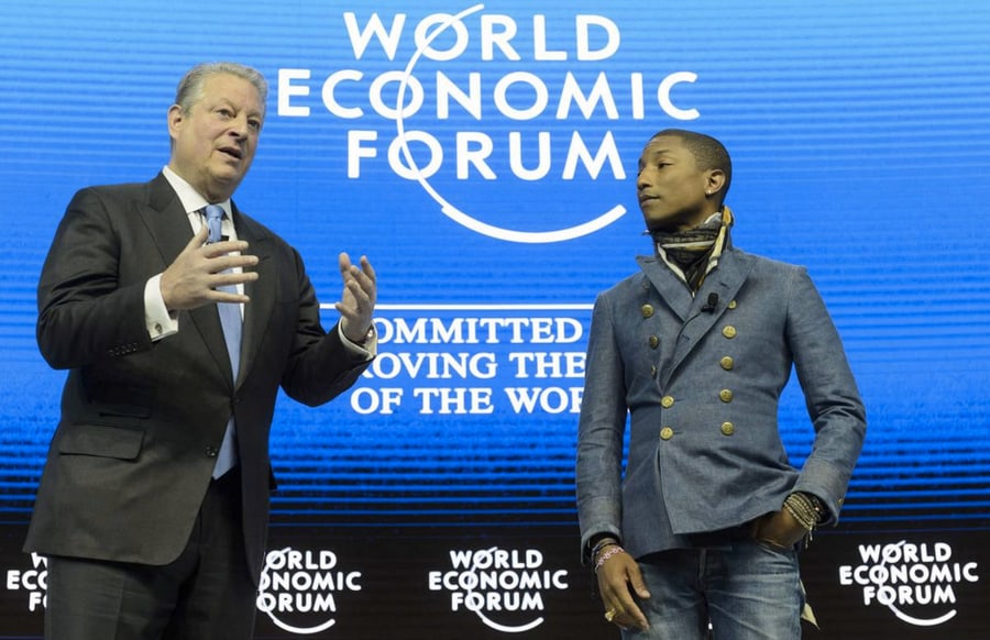 Be Dalios Grybauskaitės šią savaitę Davaso Pasaulio ekonomikos forume dalyvavo ir daug kitų pasaulio garsenybių. Nuotraukoje Al Gore ir Pharrell Williams. Nuotr. time.com