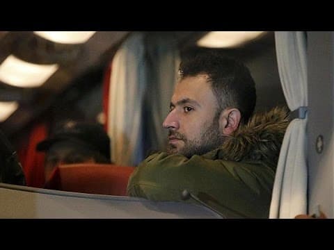 Į svečius pas Angelą Merkel atvyko autobusas su pabėgėliais