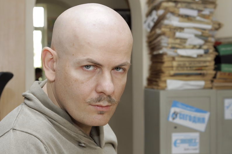 Olesis Buzina.